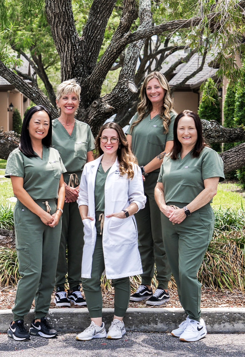 Home_Block_1_Team (1) Dr. Jenna Godwin and her dental team in Seminole FL